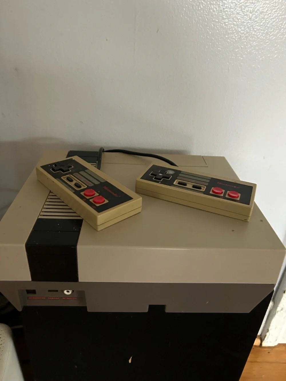 Nintendo NES Console with Cream Case and Red Logo
